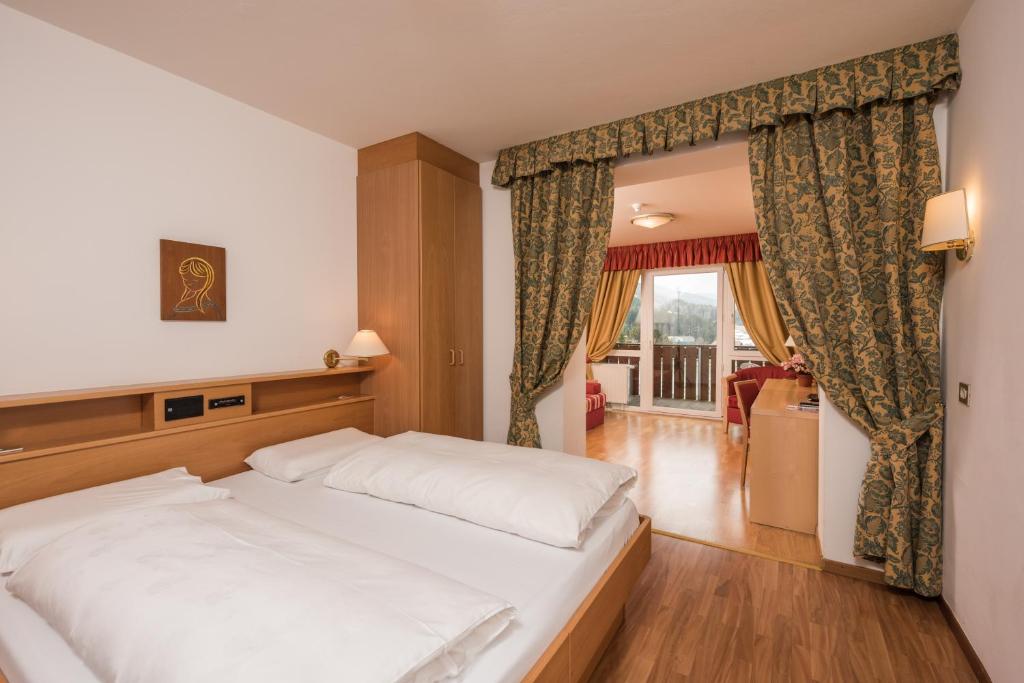 Postel nebo postele na pokoji v ubytování Hotel Union