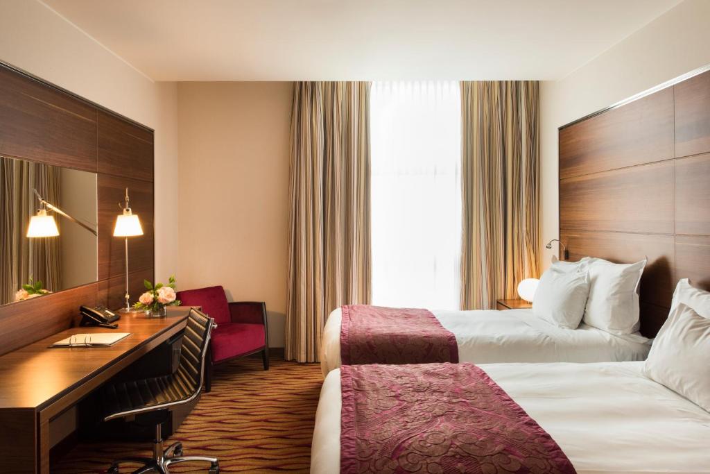 Postel nebo postele na pokoji v ubytování Best Western Premier BHR Treviso Hotel