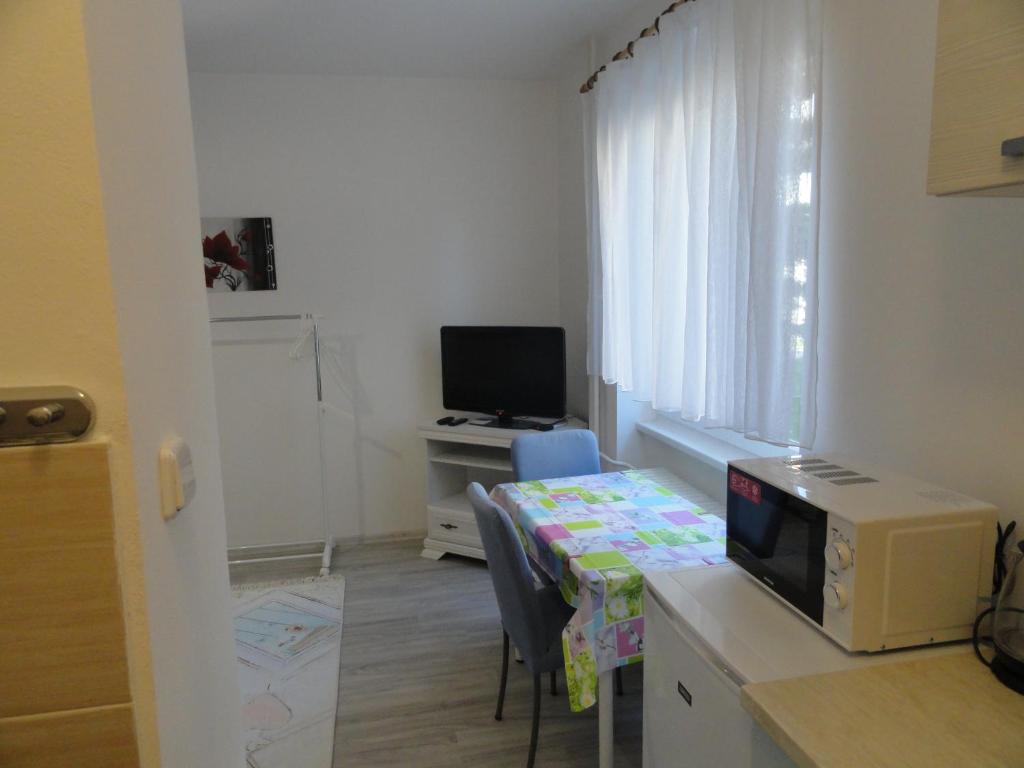TV a/nebo společenská místnost v ubytování Apartmán Sluka