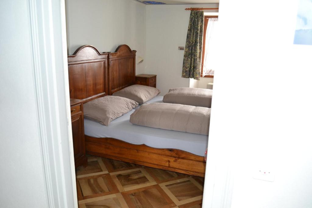 Een bed of bedden in een kamer bij Albergo San Gottardo