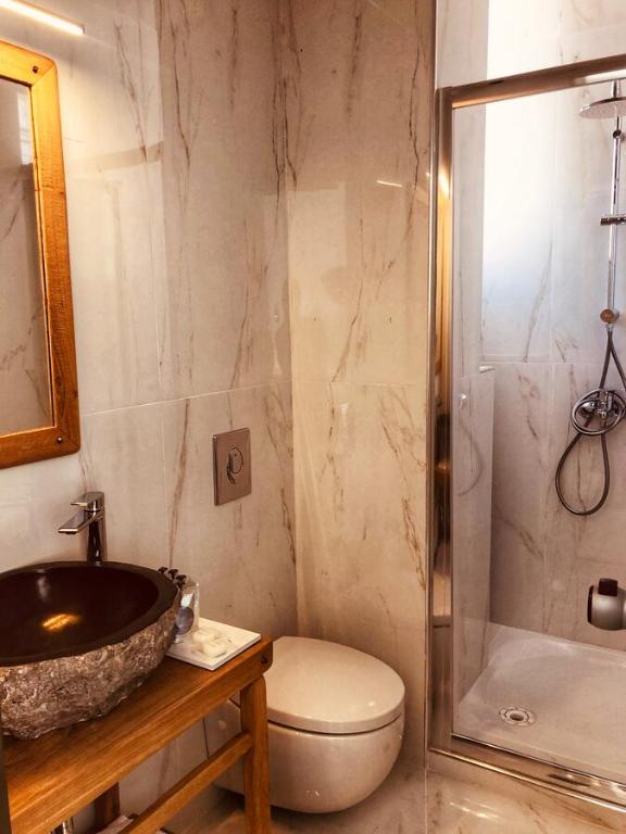 Koupelna v ubytování Hotel Acropol