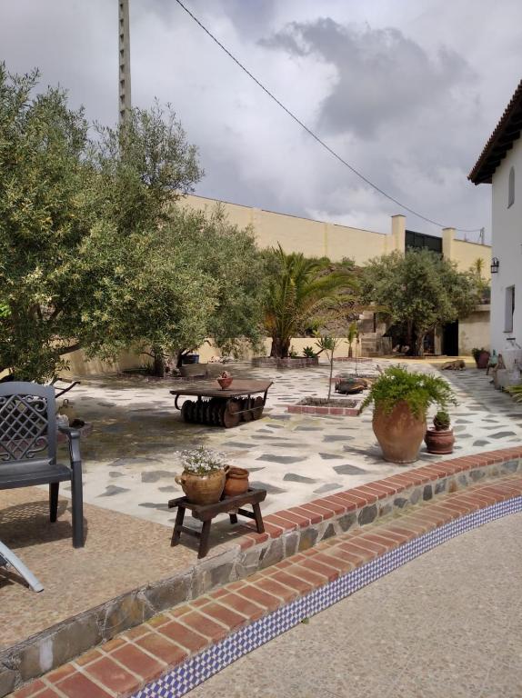 Bazén v ubytování Cortijo Mirador de Almuñecar nebo v jeho okolí