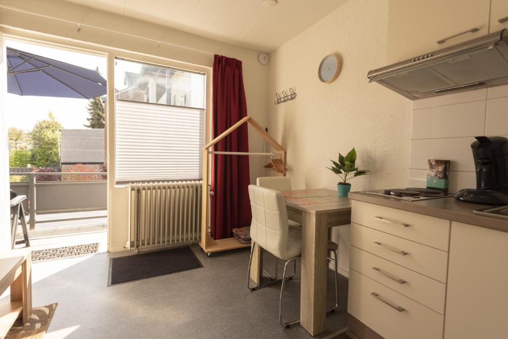 Kuchyň nebo kuchyňský kout v ubytování Hermes Appartementen