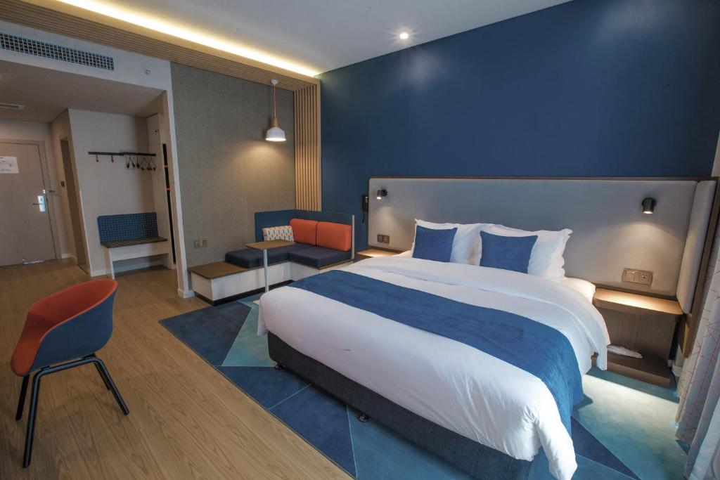 Postel nebo postele na pokoji v ubytování Holiday Inn Express Hefei High Tech by IHG