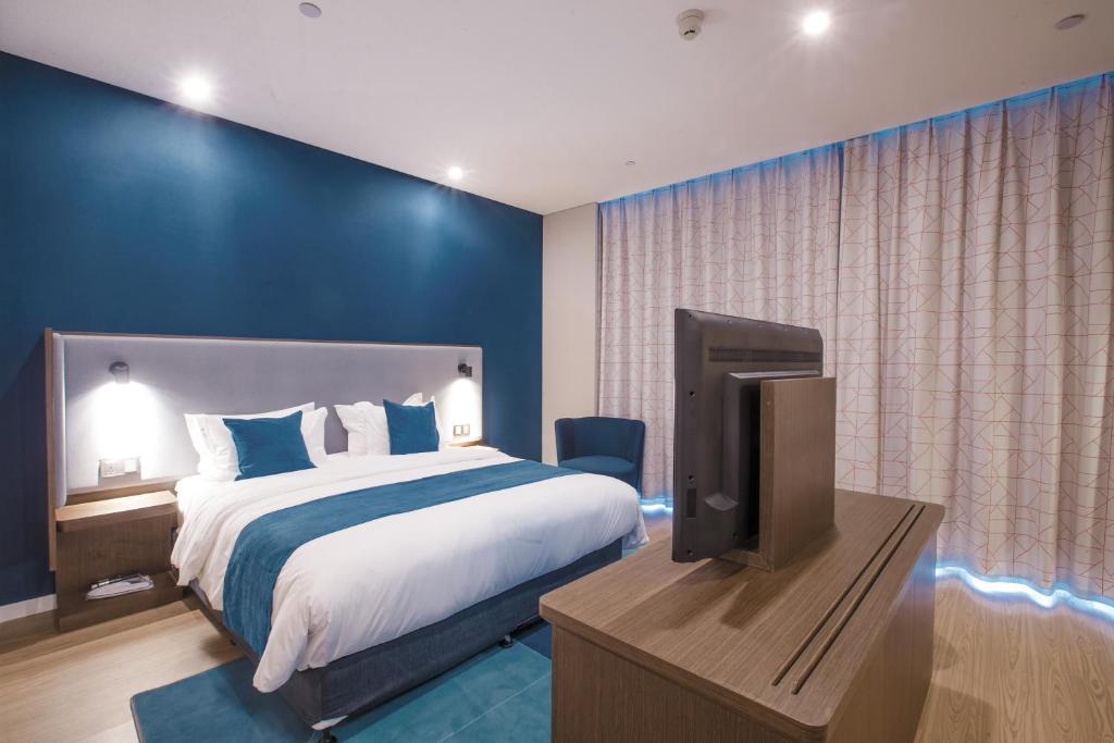 Postel nebo postele na pokoji v ubytování Holiday Inn Express Hefei High Tech by IHG
