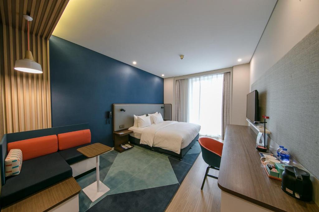 Postel nebo postele na pokoji v ubytování Holiday Inn Express Hefei High Tech by IHG