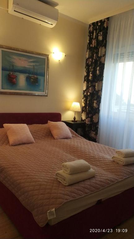 Postel nebo postele na pokoji v ubytování Diklo beach apartments Robert & Renata