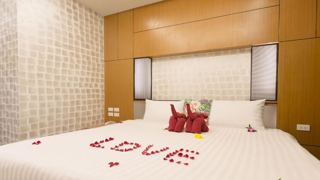 Postel nebo postele na pokoji v ubytování Anda Beachside Hotel