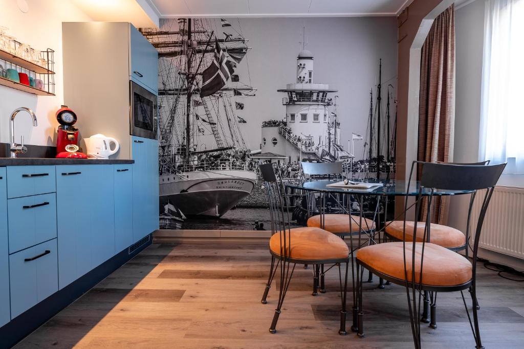 Kuchyň nebo kuchyňský kout v ubytování Hotel Almenum - het sfeervolle stadslogement -