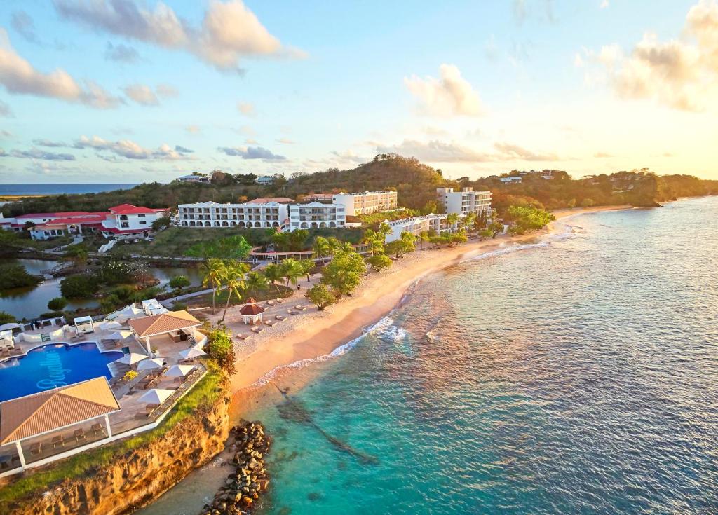 an aerial view of a resort on a beach at Royalton Grenada, An Autograph Collection All-Inclusive Resort in Bamboo
