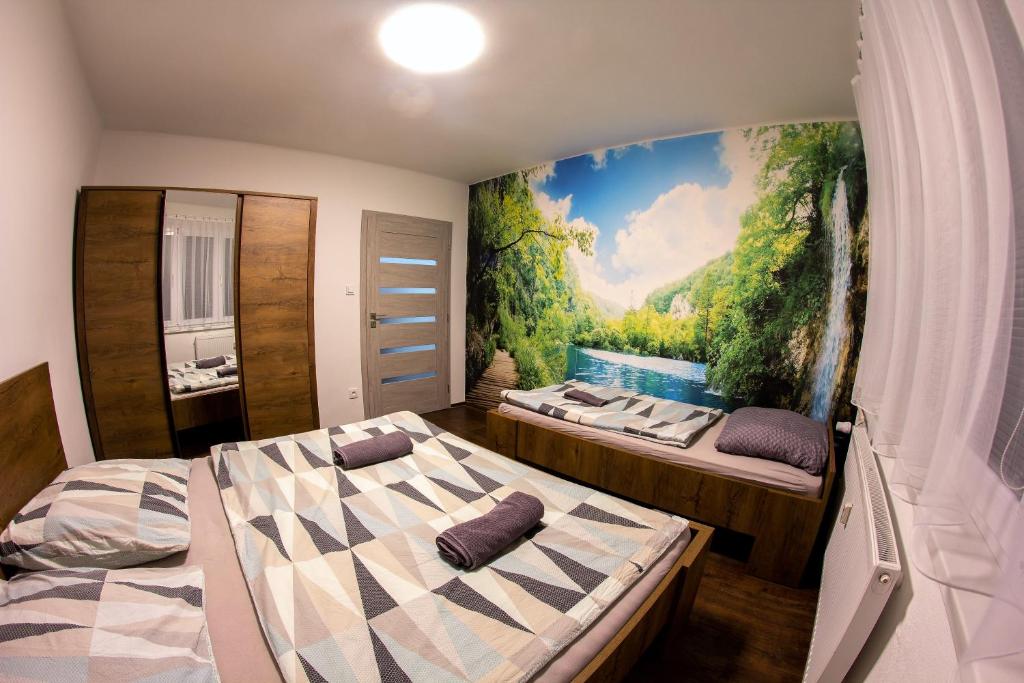 Postel nebo postele na pokoji v ubytování Modern Apartment Klatovy