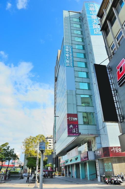 a tall building on a city street with at Green World Hotel - Zhonghua in Taipei