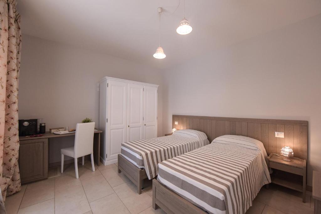 A bed or beds in a room at Terra Mater - Exclusive Cottage -
