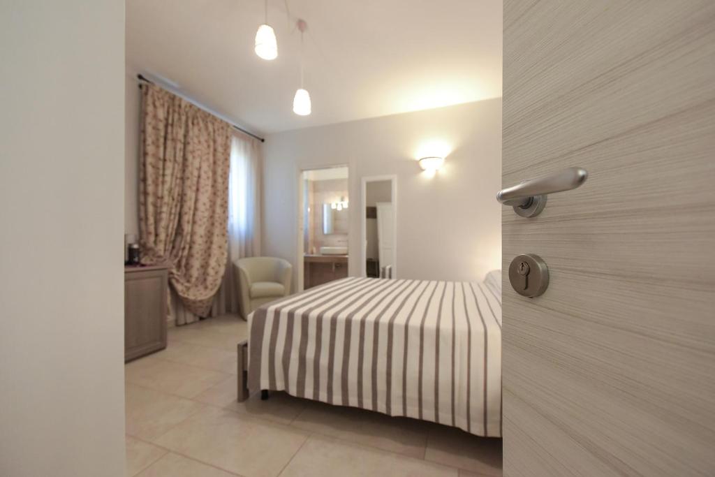 A bed or beds in a room at Terra Mater - Exclusive Cottage -