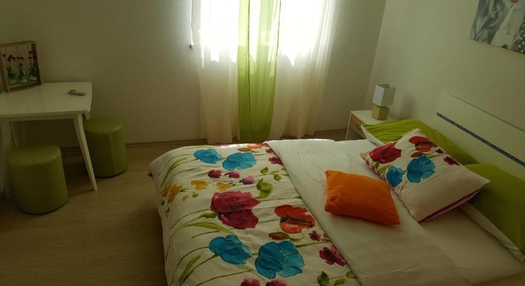 Postel nebo postele na pokoji v ubytování Barko apartment and rooms