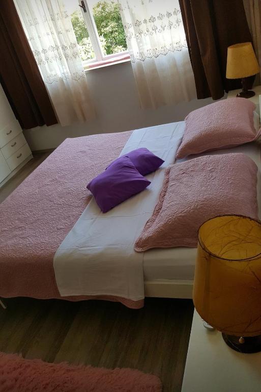 Postel nebo postele na pokoji v ubytování Barko apartment and rooms