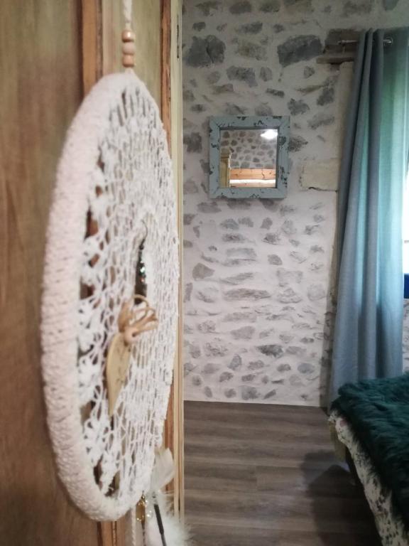 Postel nebo postele na pokoji v ubytování L'Echevine en vercors