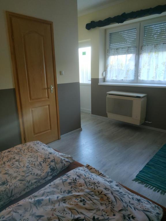 Postel nebo postele na pokoji v ubytování Cseresznyés Ház