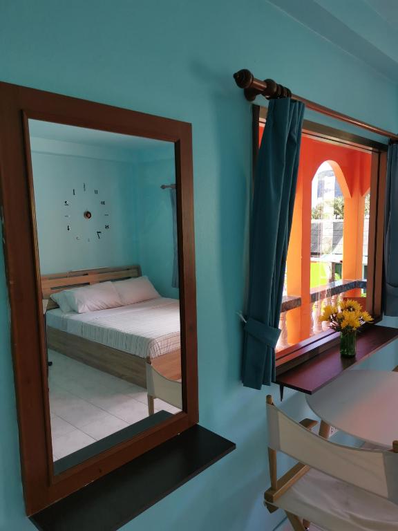 Postel nebo postele na pokoji v ubytování myPatong Social Hostel
