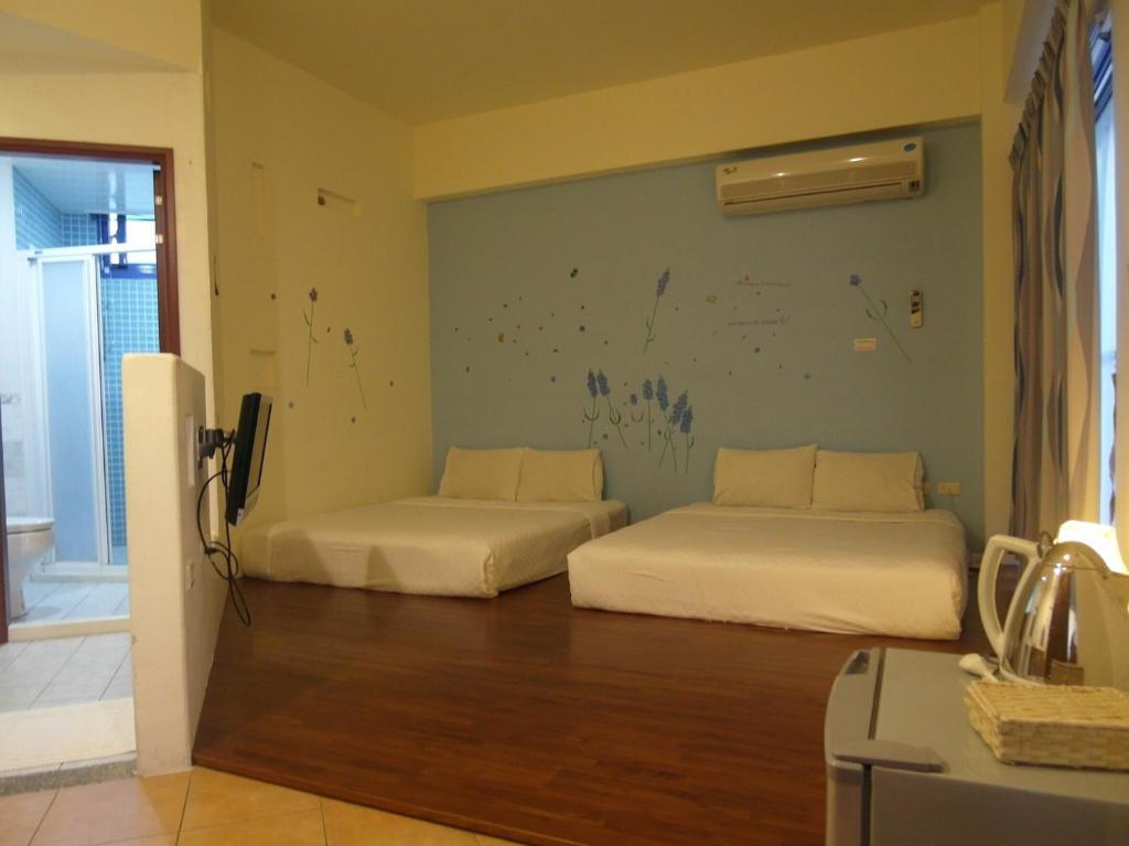 Postel nebo postele na pokoji v ubytování Morpheus B&B