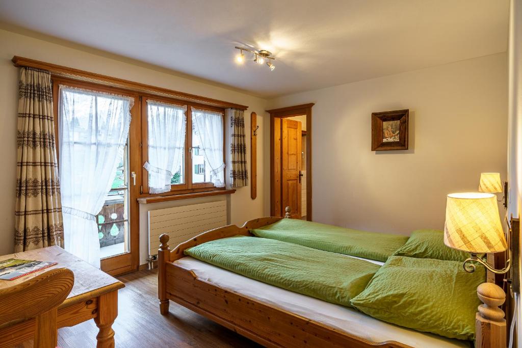 Postel nebo postele na pokoji v ubytování Hotel Silvapina