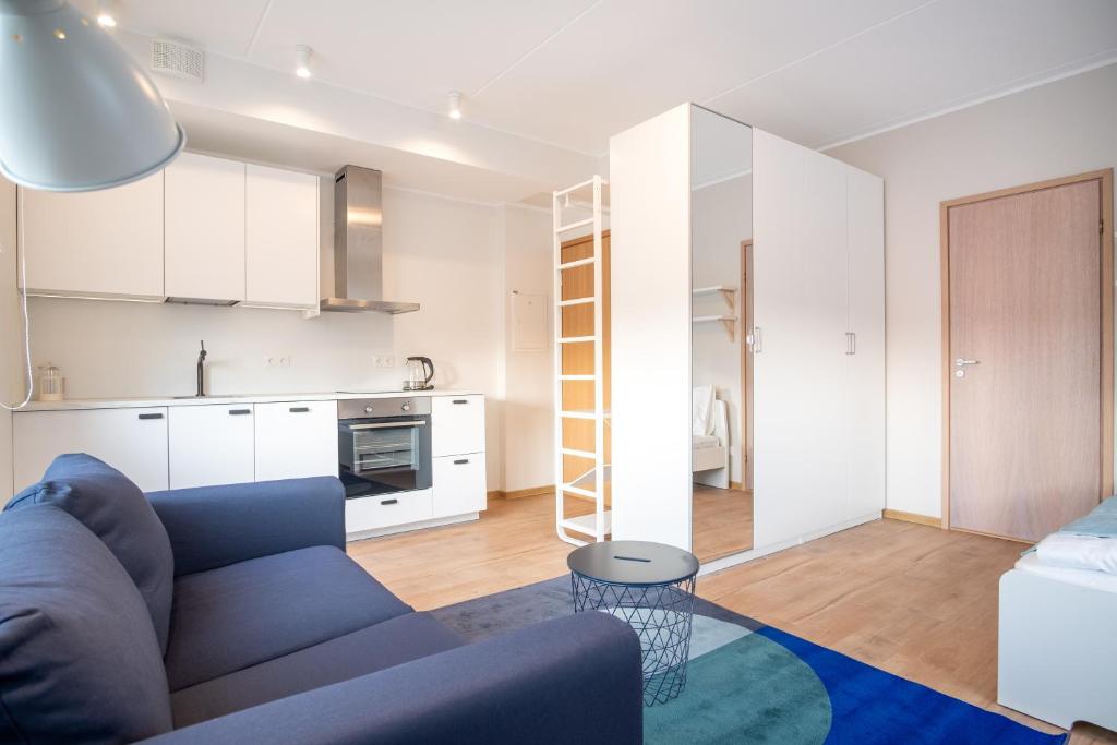 Ett kök eller pentry på Modern Mustamäe Apartments - Free parking