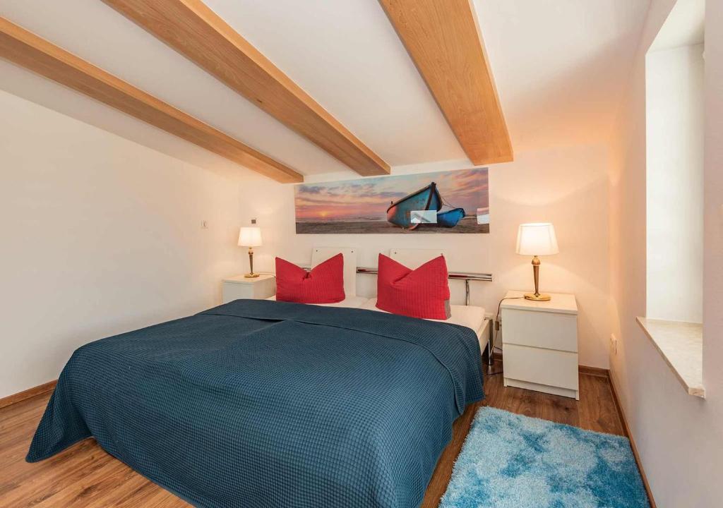 Postel nebo postele na pokoji v ubytování Ferienhaus Ingrid