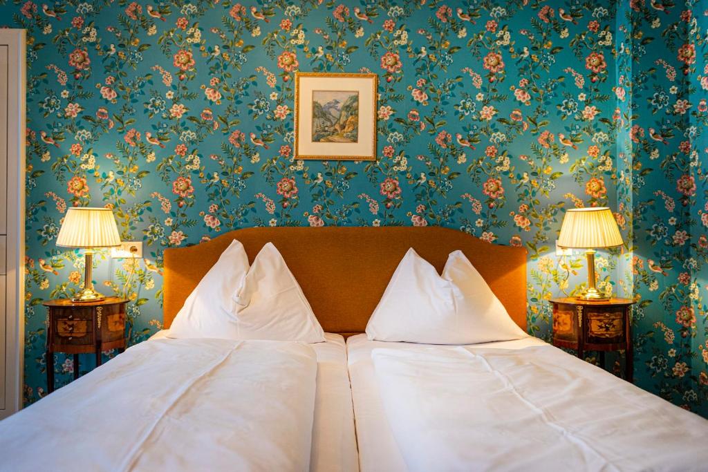 Postel nebo postele na pokoji v ubytování Villa Excelsior Hotel & Kurhaus