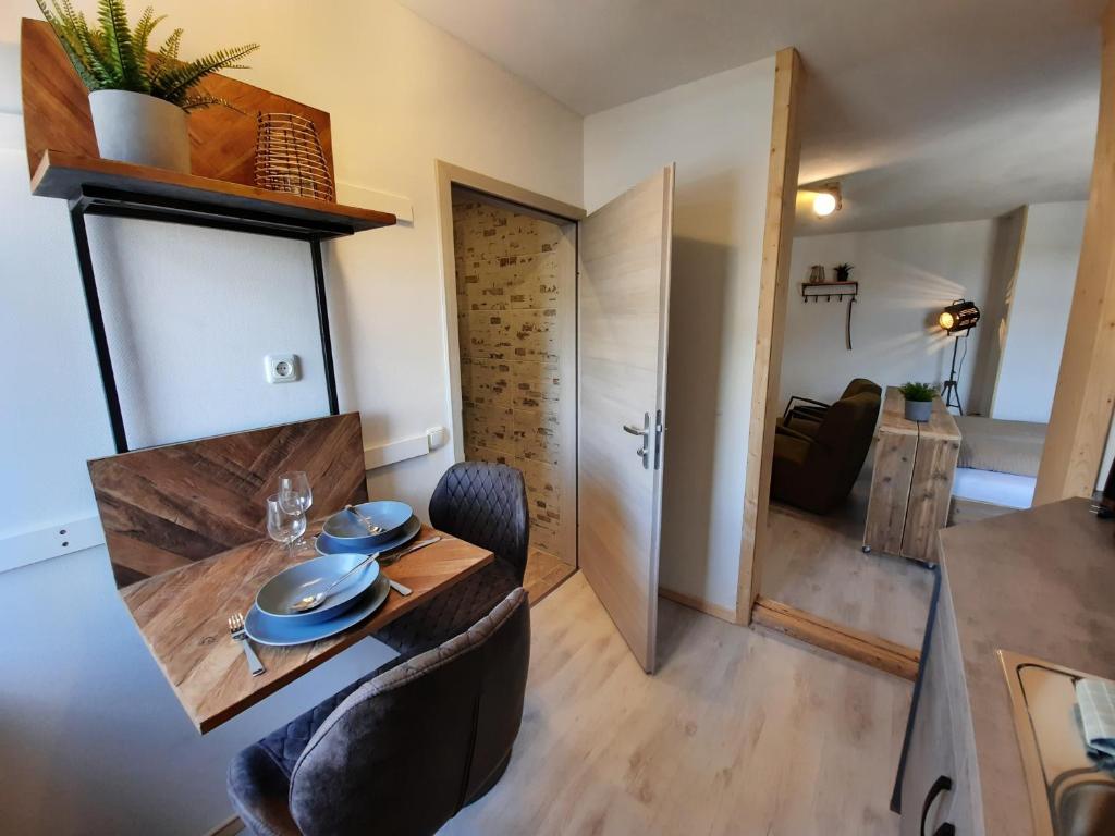 Posezení v ubytování Apartments und Bistro Zum Glasmacher
