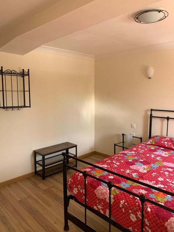 Postel nebo postele na pokoji v ubytování LA BASTIDE DU GINESTE - Poppys