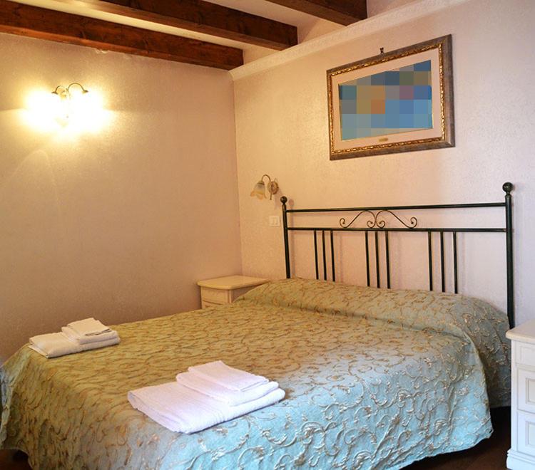 Postel nebo postele na pokoji v ubytování Oceano Mare B&B