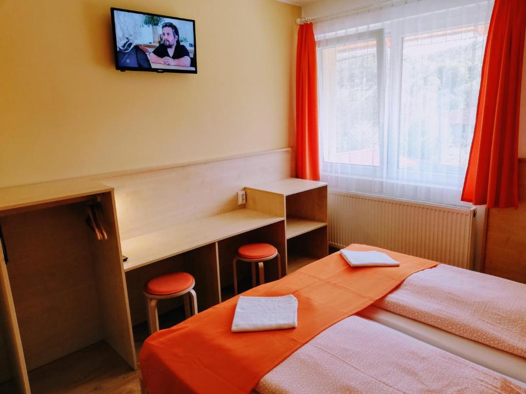 Posteľ alebo postele v izbe v ubytovaní Lótuszvirág Vendégház