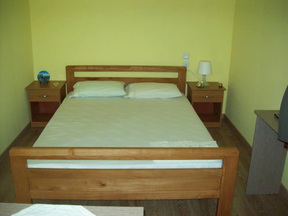 Кровать или кровати в номере Mιχαλης Apartments