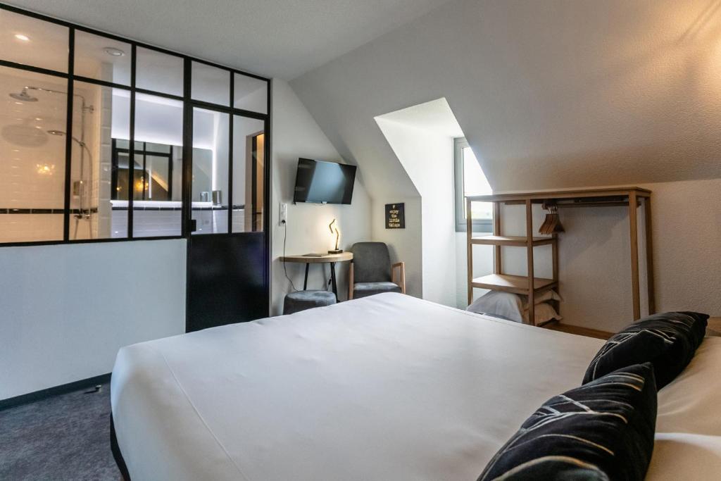 Postel nebo postele na pokoji v ubytování Relais Amadourien