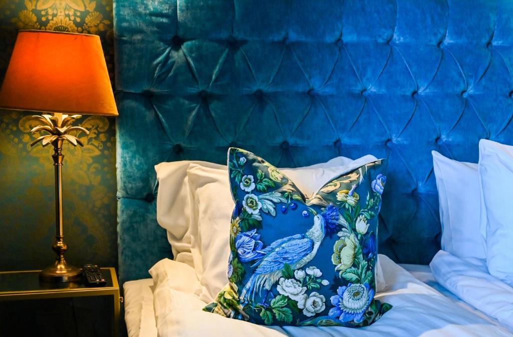 Postel nebo postele na pokoji v ubytování Palace Hotell