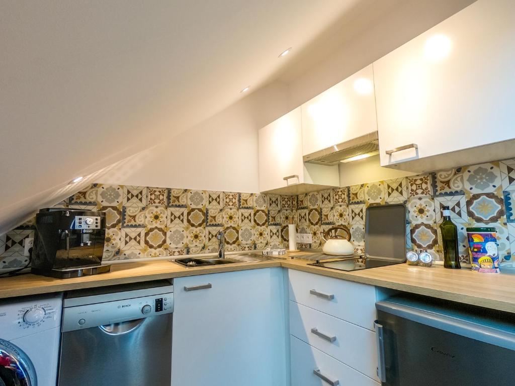Kuchyň nebo kuchyňský kout v ubytování Apartament dwupoziomowy Ski&Bike