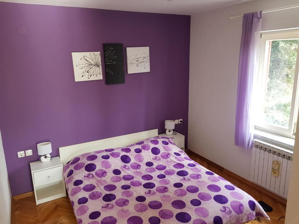 Posteľ alebo postele v izbe v ubytovaní Apartments Ivana Diklo