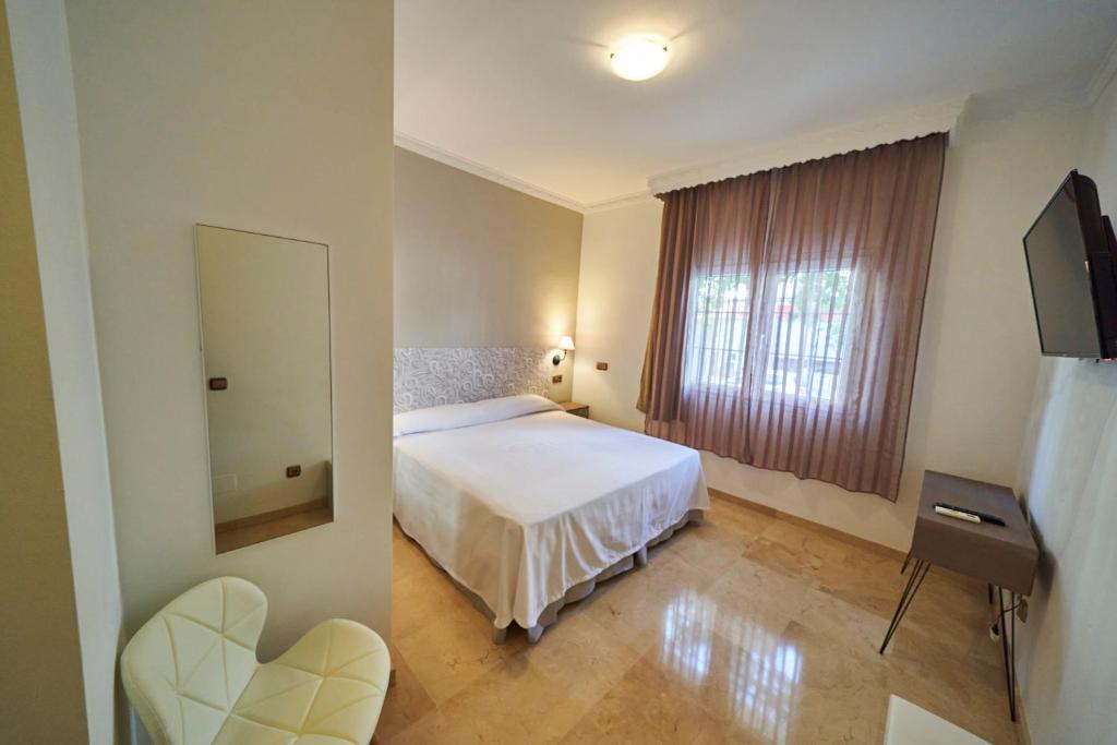 Postel nebo postele na pokoji v ubytování Hotel Bajamar Centro