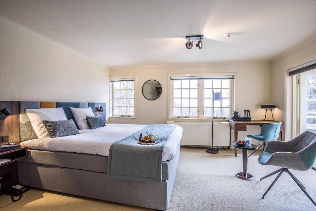 Een bed of bedden in een kamer bij Landgoed De Uitkijk Hellendoorn
