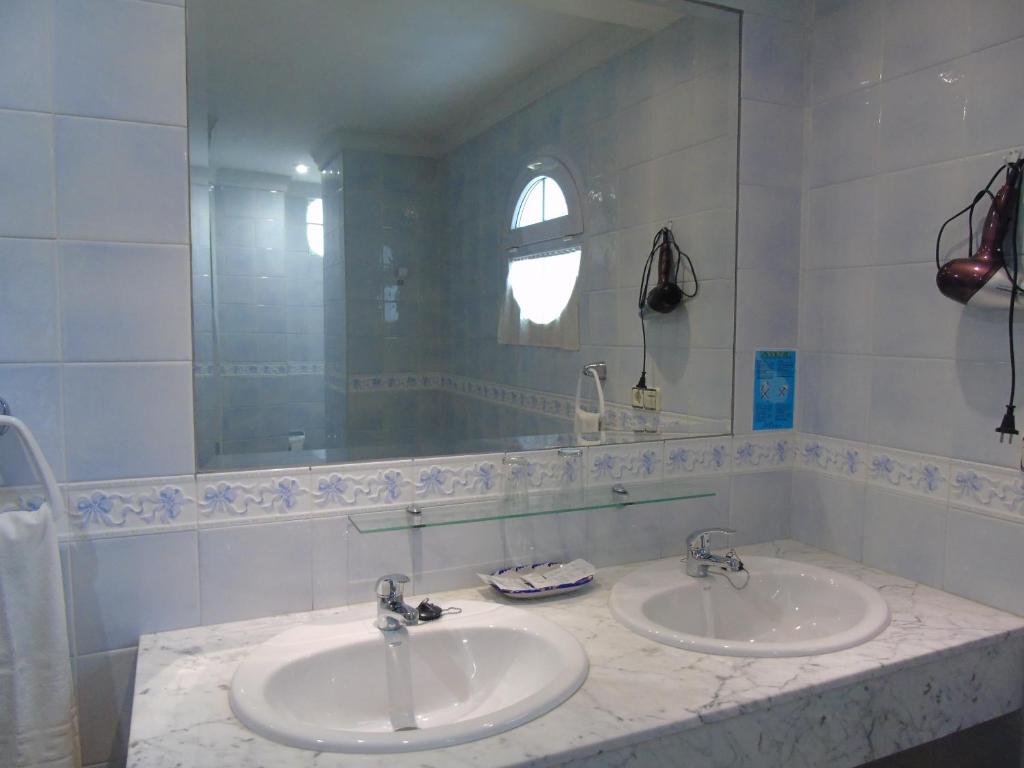 Un baño de Apartamentos Turísticos Cumbres Verdes