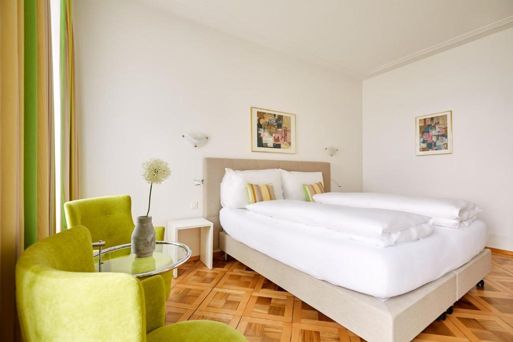 Postel nebo postele na pokoji v ubytování Hotel Schmid & Alfa