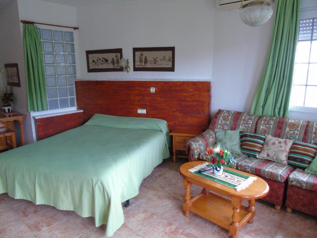 Cama o camas de una habitación en Apartamentos Turísticos Cumbres Verdes