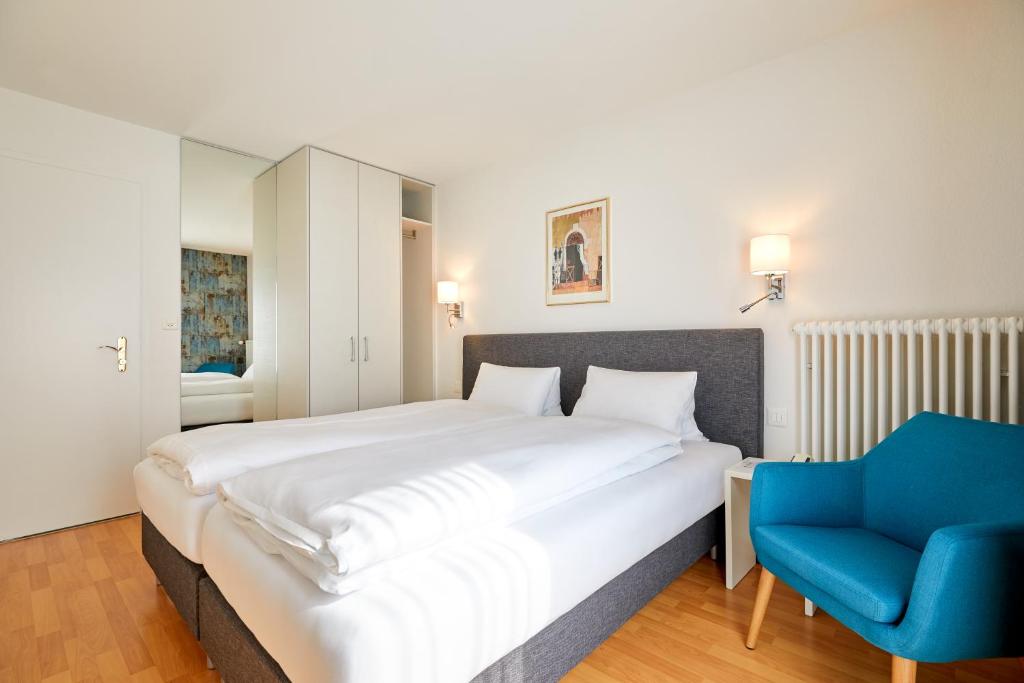 Postel nebo postele na pokoji v ubytování Hotel Schmid & Alfa