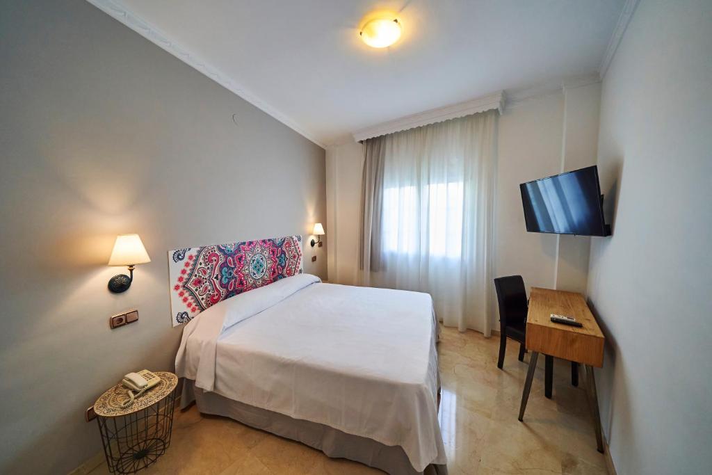 TV a/nebo společenská místnost v ubytování Hotel Bajamar Centro