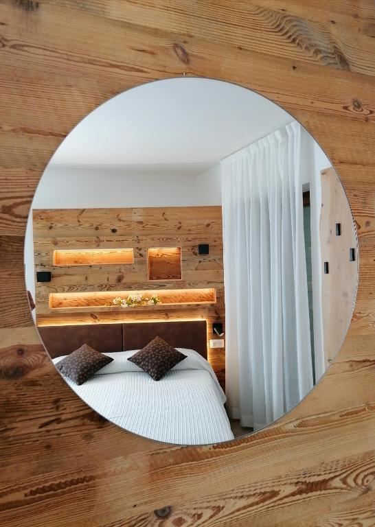 Postel nebo postele na pokoji v ubytování Albergo Silvana