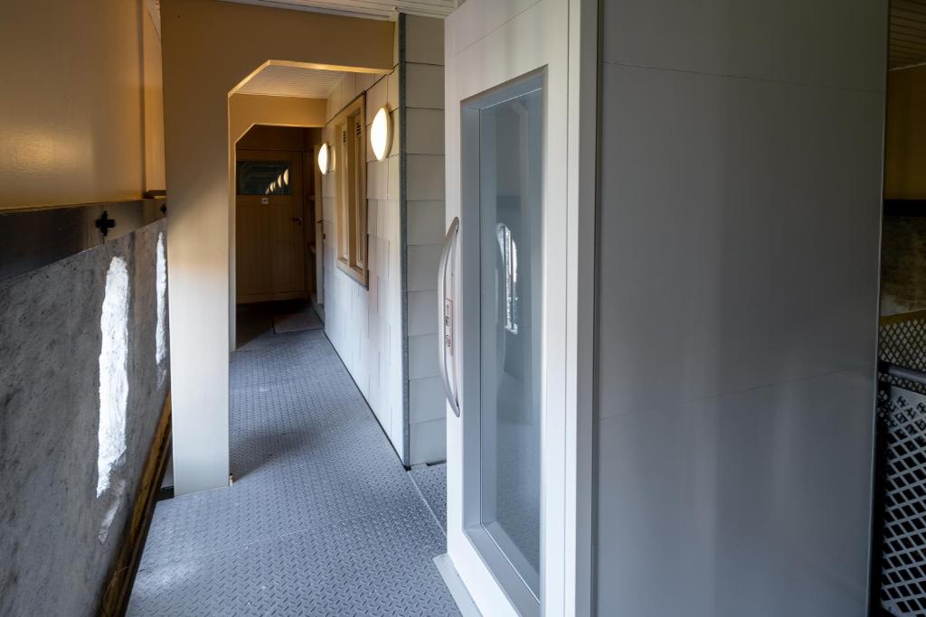 Postel nebo postele na pokoji v ubytování Hotel Almenum - het sfeervolle stadslogement -