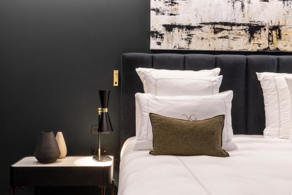 Postel nebo postele na pokoji v ubytování Villa Geba Boutique Hotel