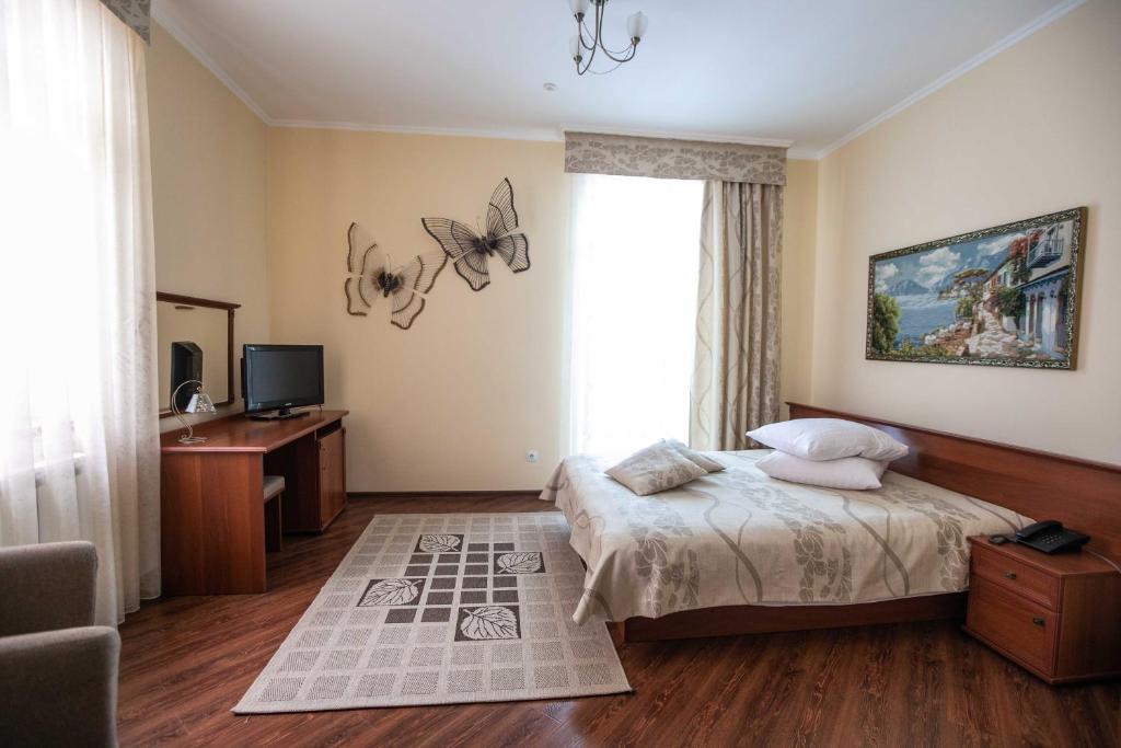 Postel nebo postele na pokoji v ubytování Карпаты