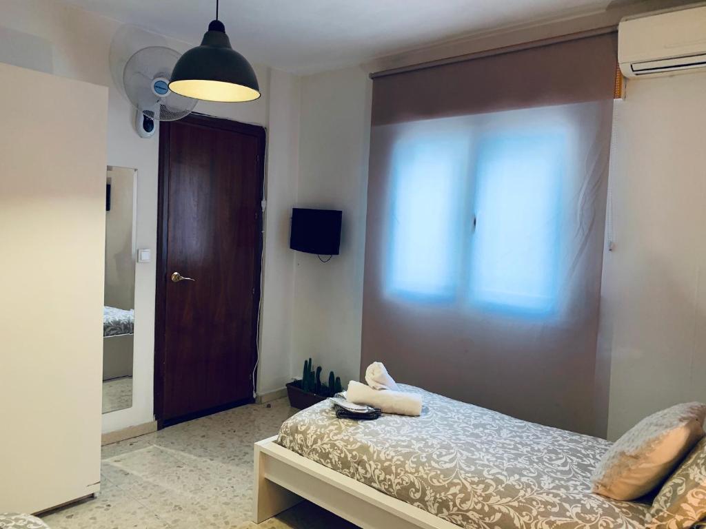 Posteľ alebo postele v izbe v ubytovaní Rafaela Guest House