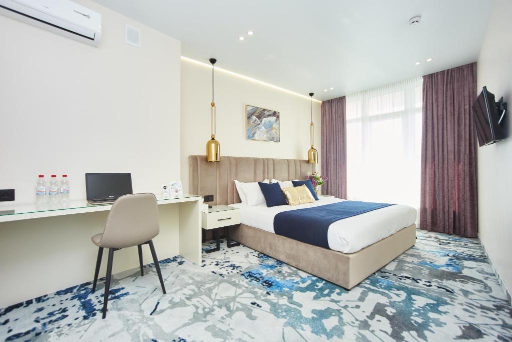 TV a/nebo společenská místnost v ubytování Jupiter Hotel